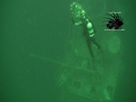 Diver_descends_with_wreath